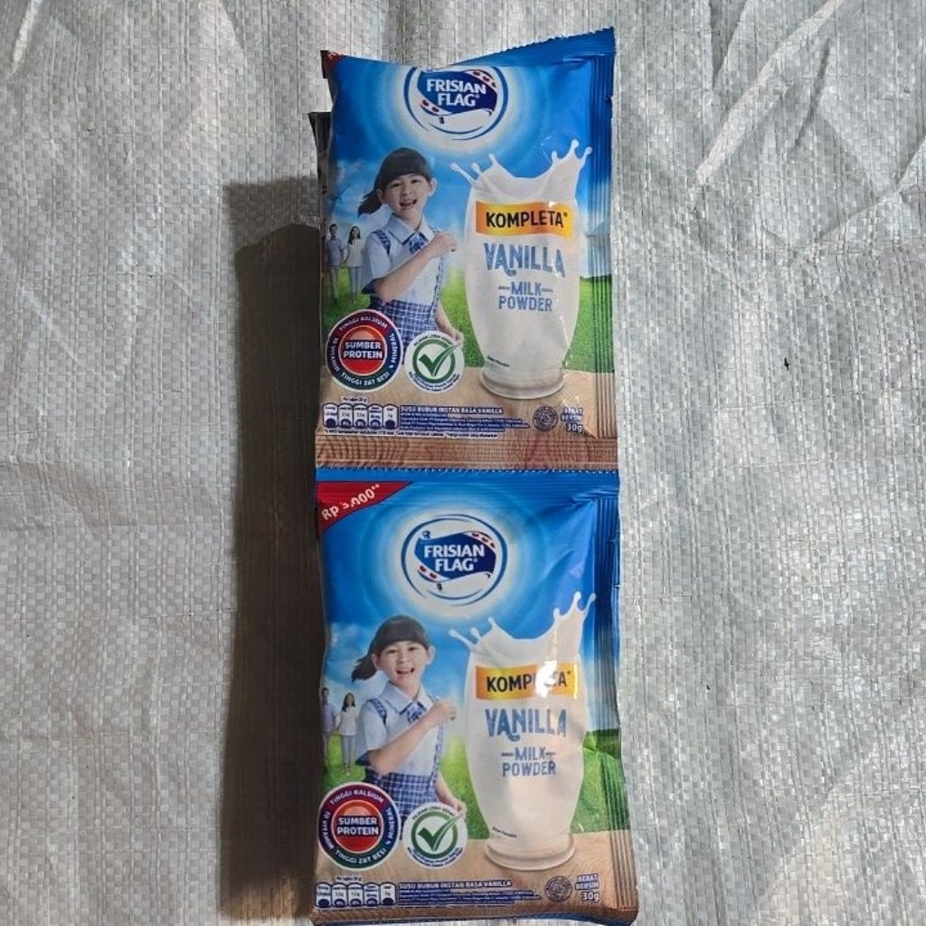 Susu frisian flag vanilla bendera renteng isi 10 ( BUBUK RENTENG )