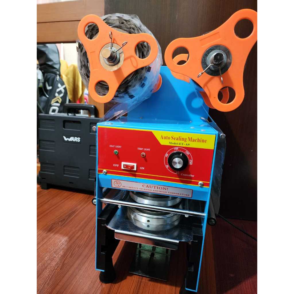 Mesin sealer ice semi otomatis