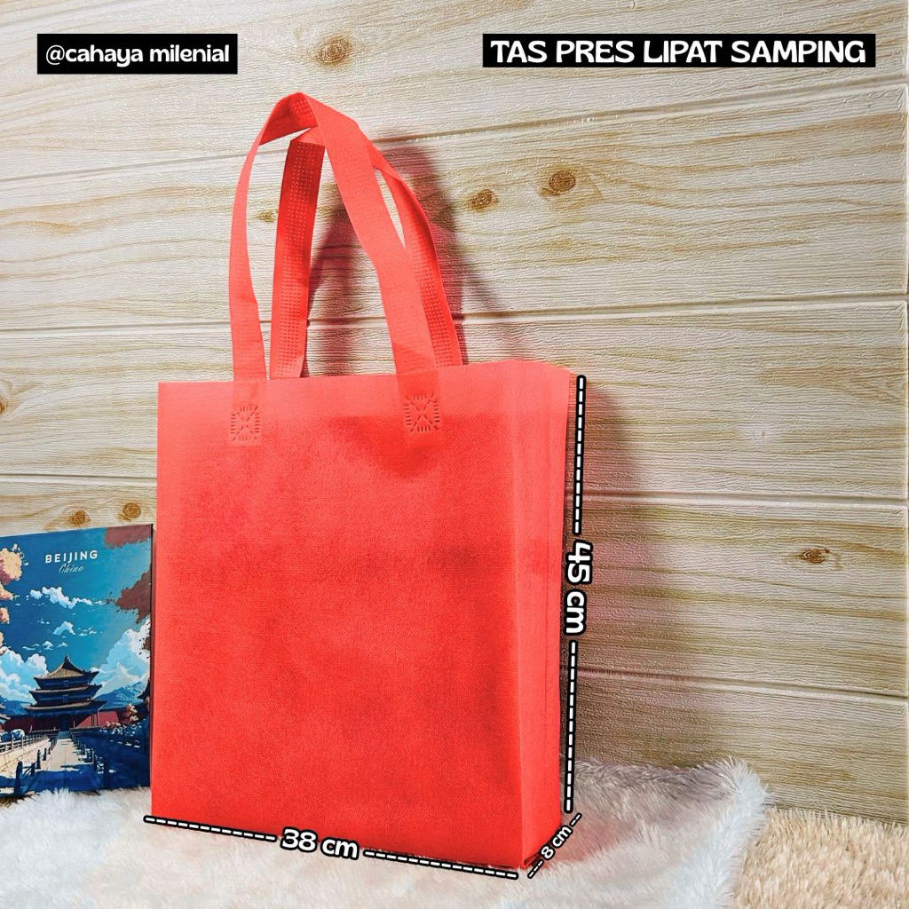 

Tas oleh-oleh haji dan umroh// 38cm x 8cm x 45cm// tas pres// tas spunbond// 5 lusin isi 60