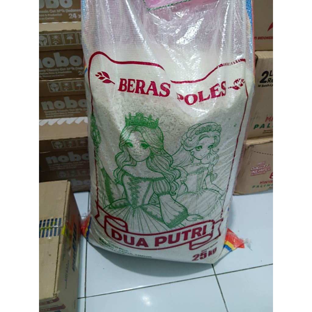 

beras poles dua putri ,karena sak sakan diecer ,timbangan 5 kgan dikemas pakai kantong kresek bagus tidak pecah