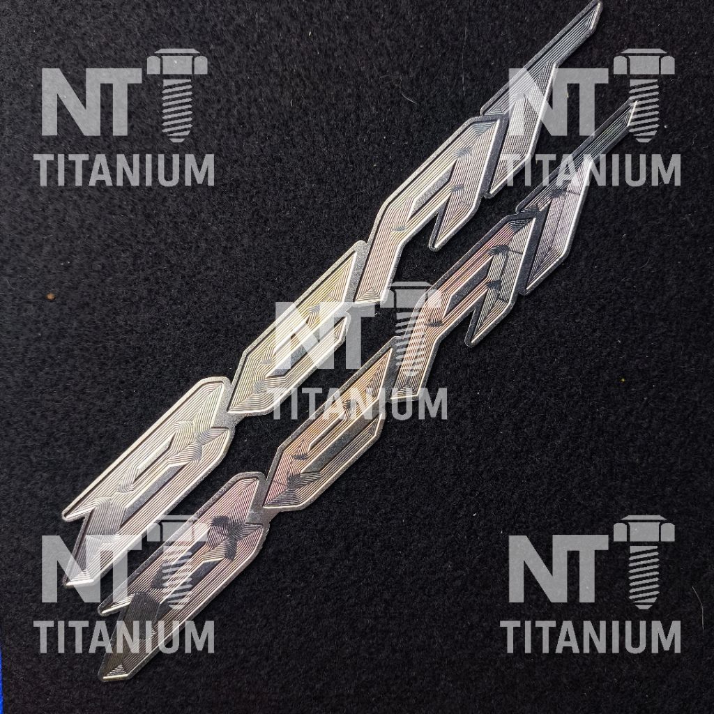 Emblem Beat Silver Stainless Bahan Titanium