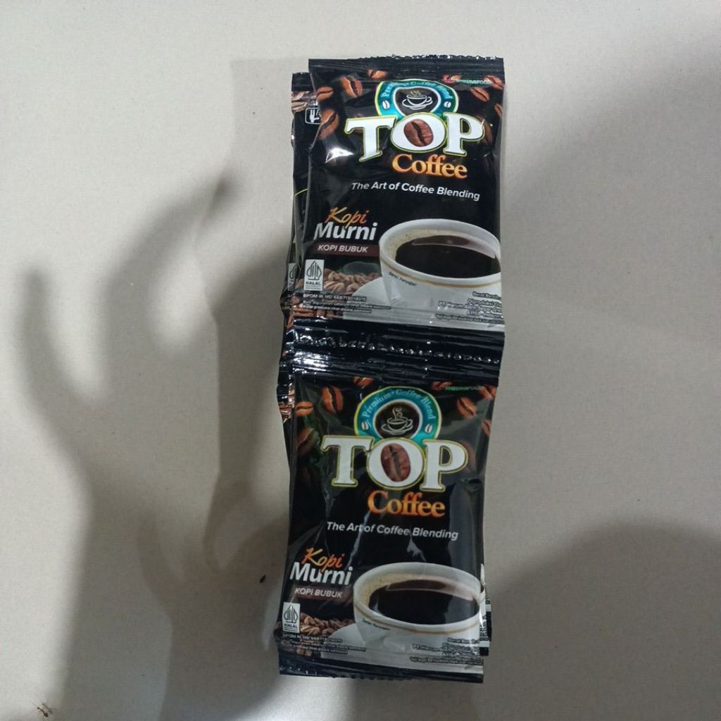 

top coffee murni 7gr 1 renteng isi 10 sachet