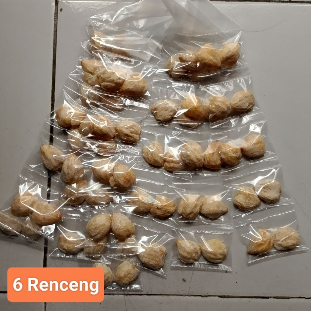 

Bumbu dapur/rempah-rempah Kemiri belah kemasan Renceng 6 Renceng x 5 pcs/Renceng