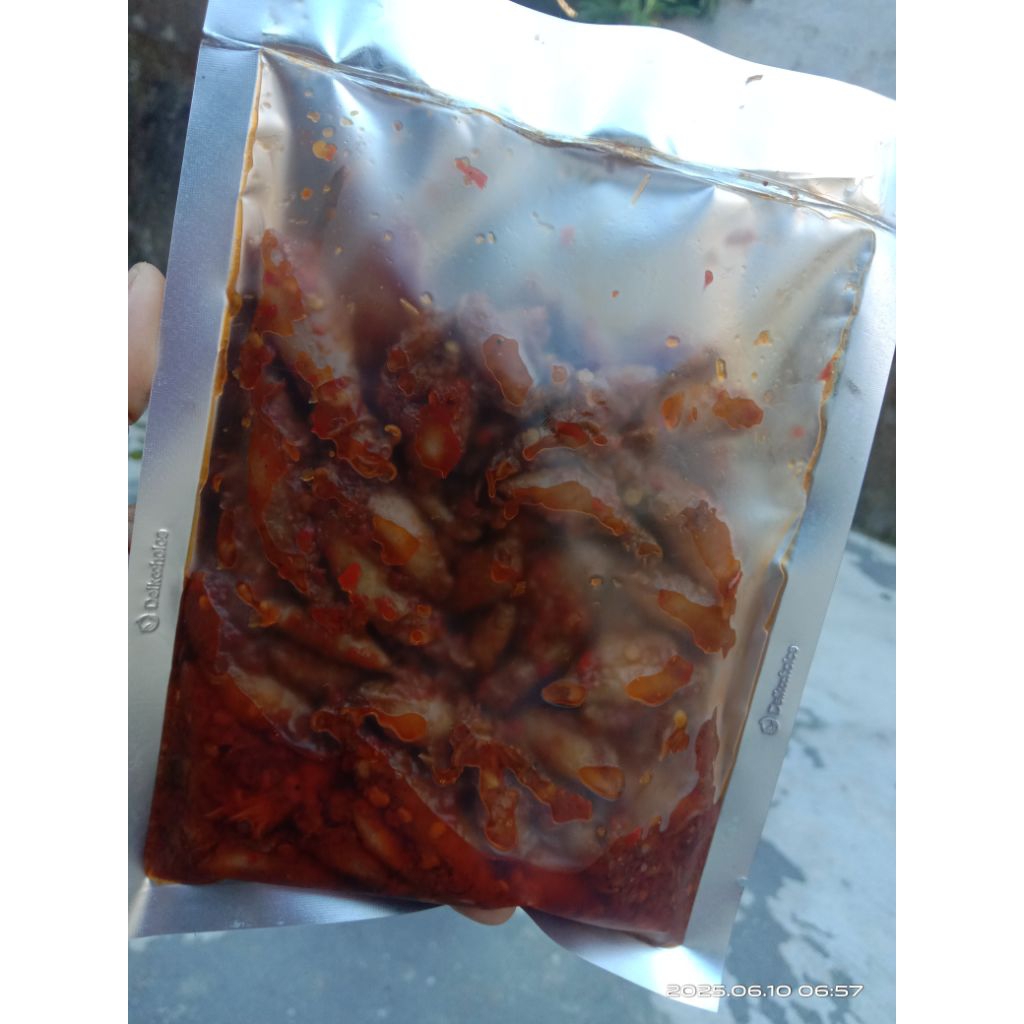 

Sambel Baby Cumi Asin Pedas Nampol Kemasan 250gr