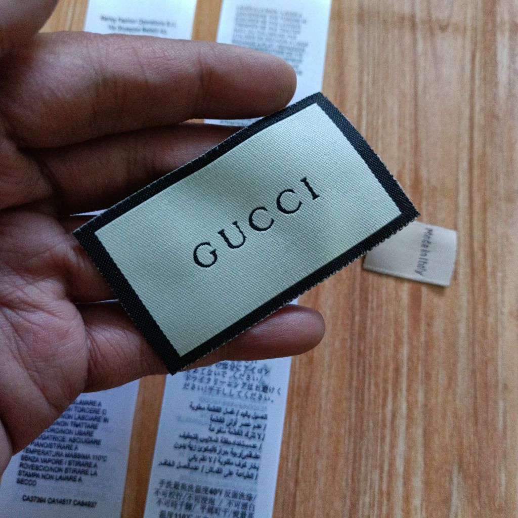 

tag label Gucci