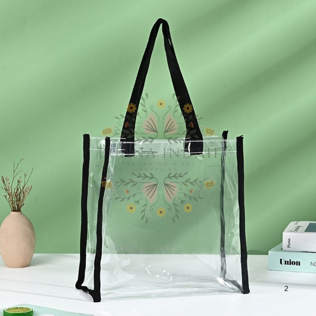 

GOODIEBAG TRANSPARAN LIST TALI HITAM UK 40X30X15 MN-1930 IMUT KADO UNIK SOUVERNIR