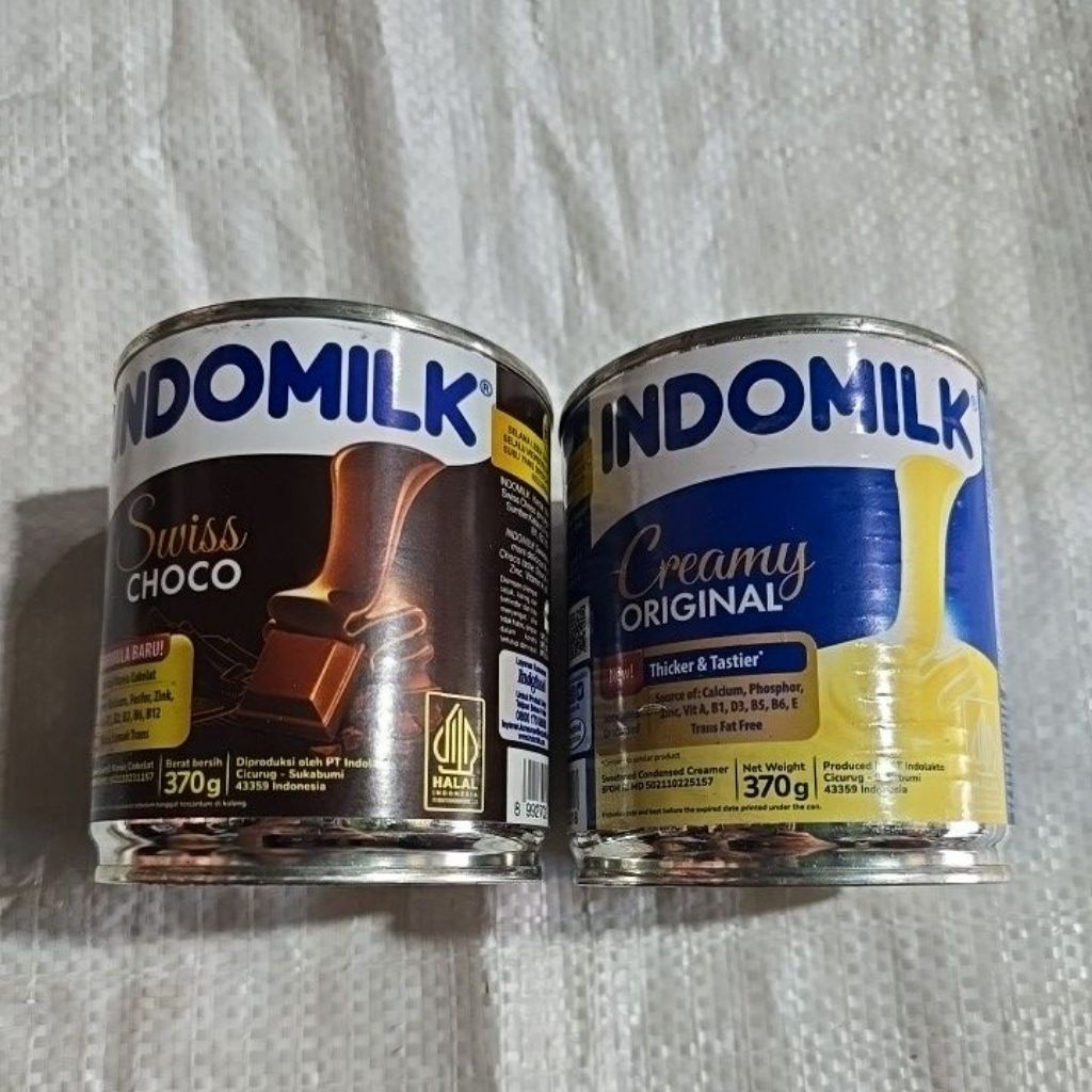 

Susu indomilk kaleng putih dan coklat 370g