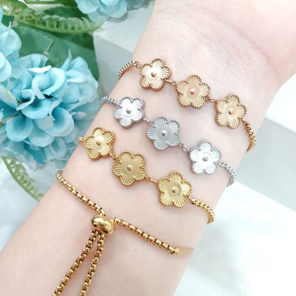 Gelang Serut Wanita Perhiasan Titanium Gold Plated Perak Motif Bunga Clofer