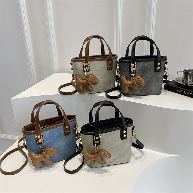 Tas wanita yang besar permukaan yang lembut gaya buang tas baru tas ember yang bagus, dan tas bahu y