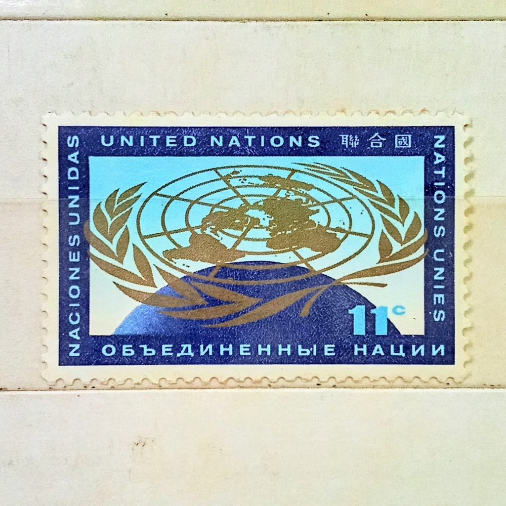 

Prangko Koleksi Filateli United Nations 1962 Emblem Over Globe