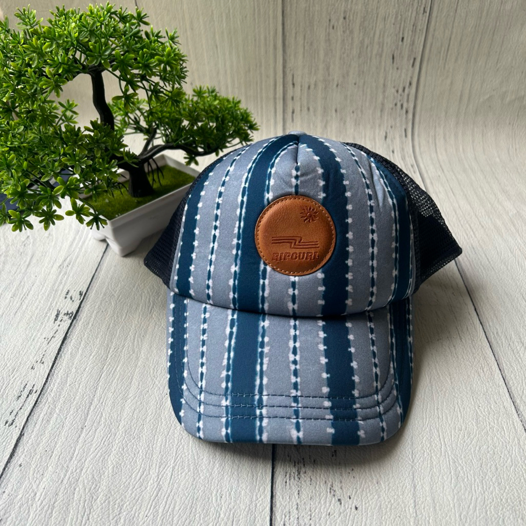 Topi Ripcurl nomad strip trucker