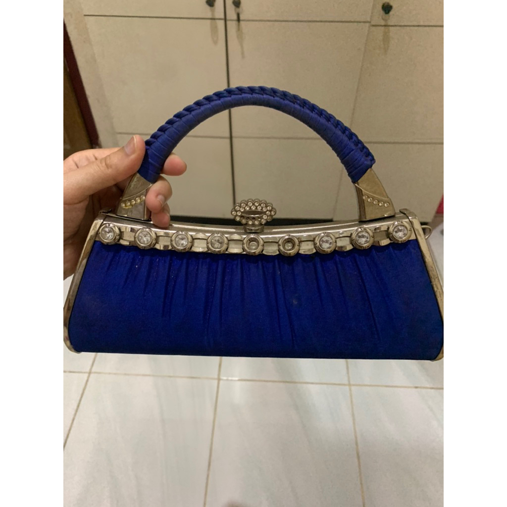 PL tas pesta biru