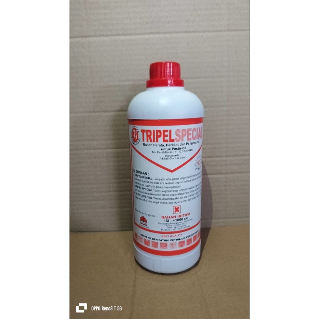 PEREKAT PERATA DAN PENGEMUISI PESTISIDA TRIPEL SPECIAL 1LITER