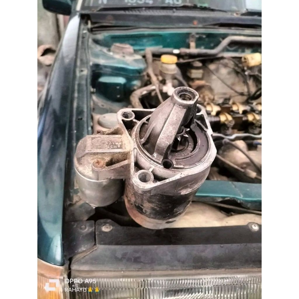 Dinamo starter copotan ford laser