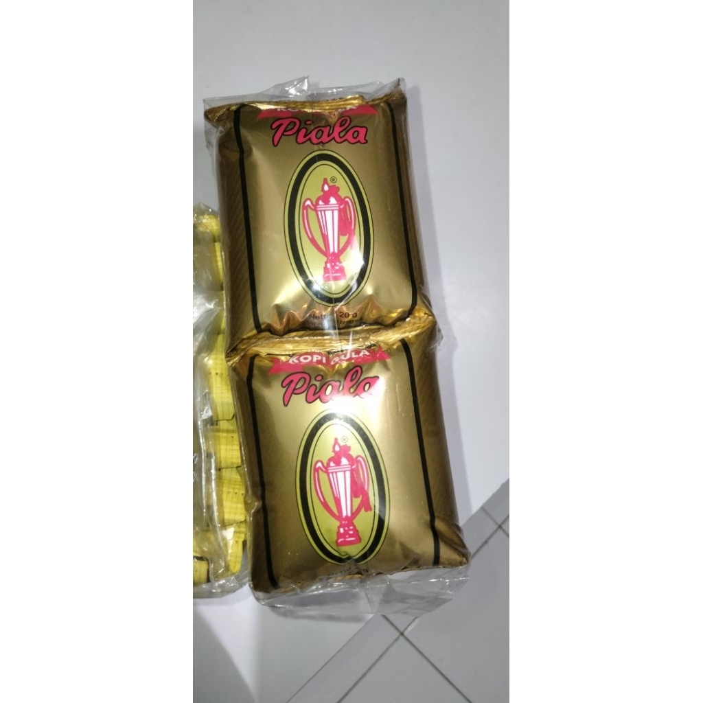

Kopi piala plus gula / 1pak isi 2 renceng @ 10 sachet
