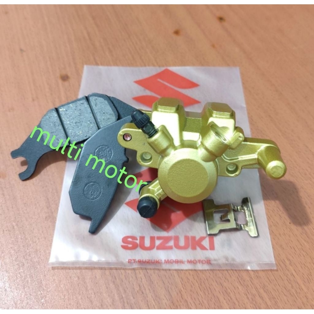 kaliper cakram belakang shogun 125 fl,shogun 125 sp,nr,rr,axelo