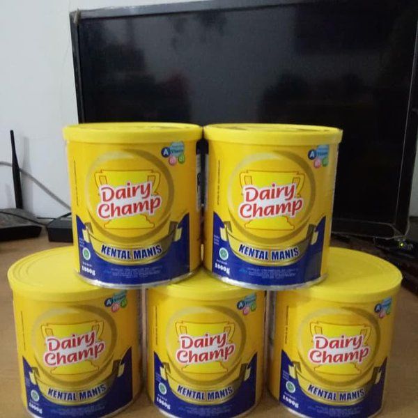 

SUSU kental manis dairy champ 1 kaleng 1kg