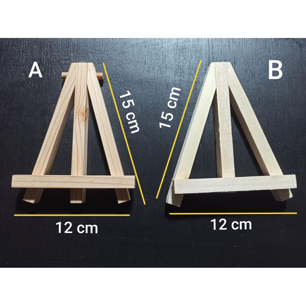 

Mini Easel Stand Tripod Kayu Wooden Easel Holder Mini tinggi: 15 cm lebar : 12 cm Sandaran Hp Dan Kanvas Lukis