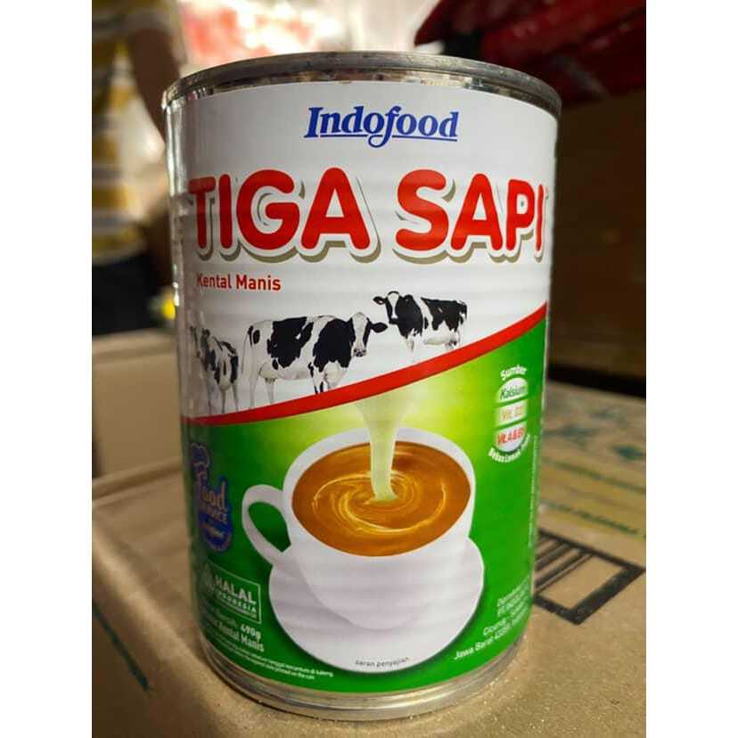 

SUSU KENTAL MANIS TIGA SAPI Cap Tiga Sapi Condensed Milk