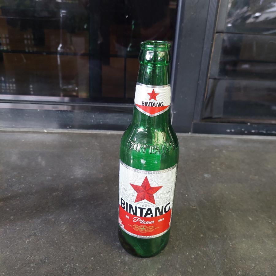Botol bir bintang bekas/kosong
