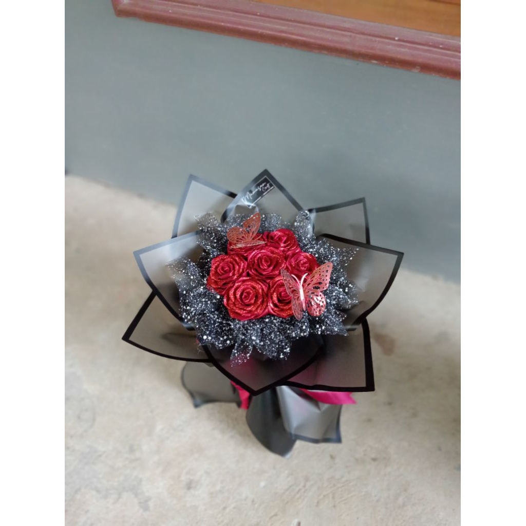 

Buket pita satin 7 tangkai