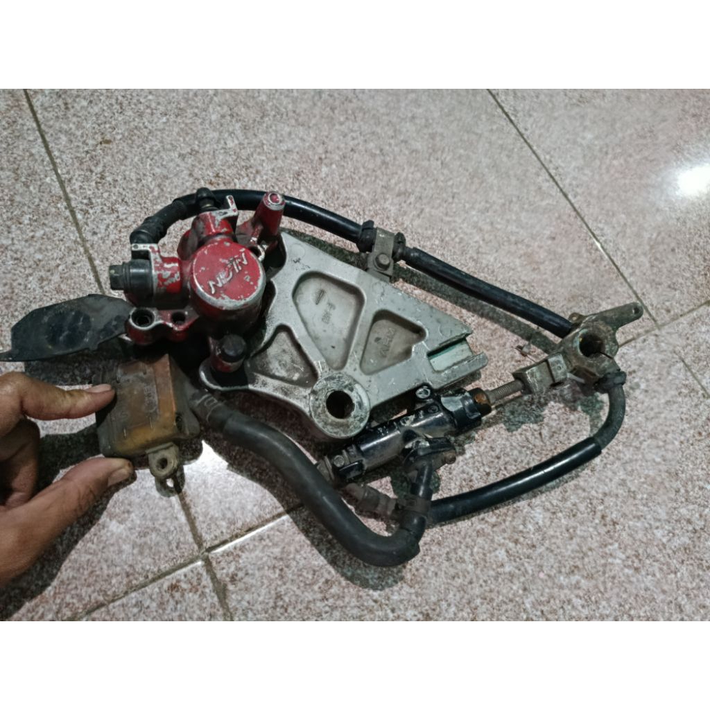 Rem belakang tiger revo