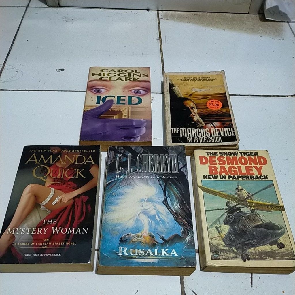 Novel import  ICED Carol Higgins Clark . The Marcus device Ib Melchior The snow Tiger  Desmond bagle
