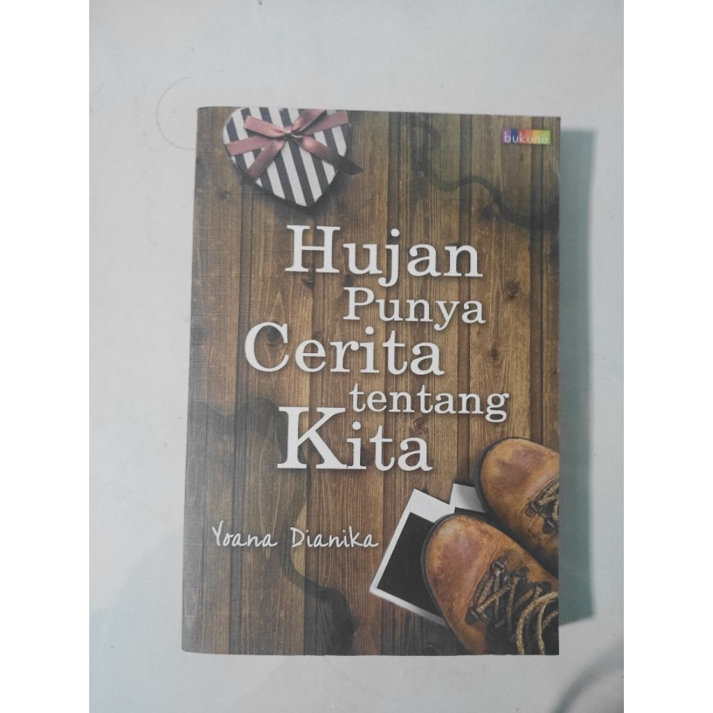 

HUJAN PUNYA CERITA TENTANG KITA