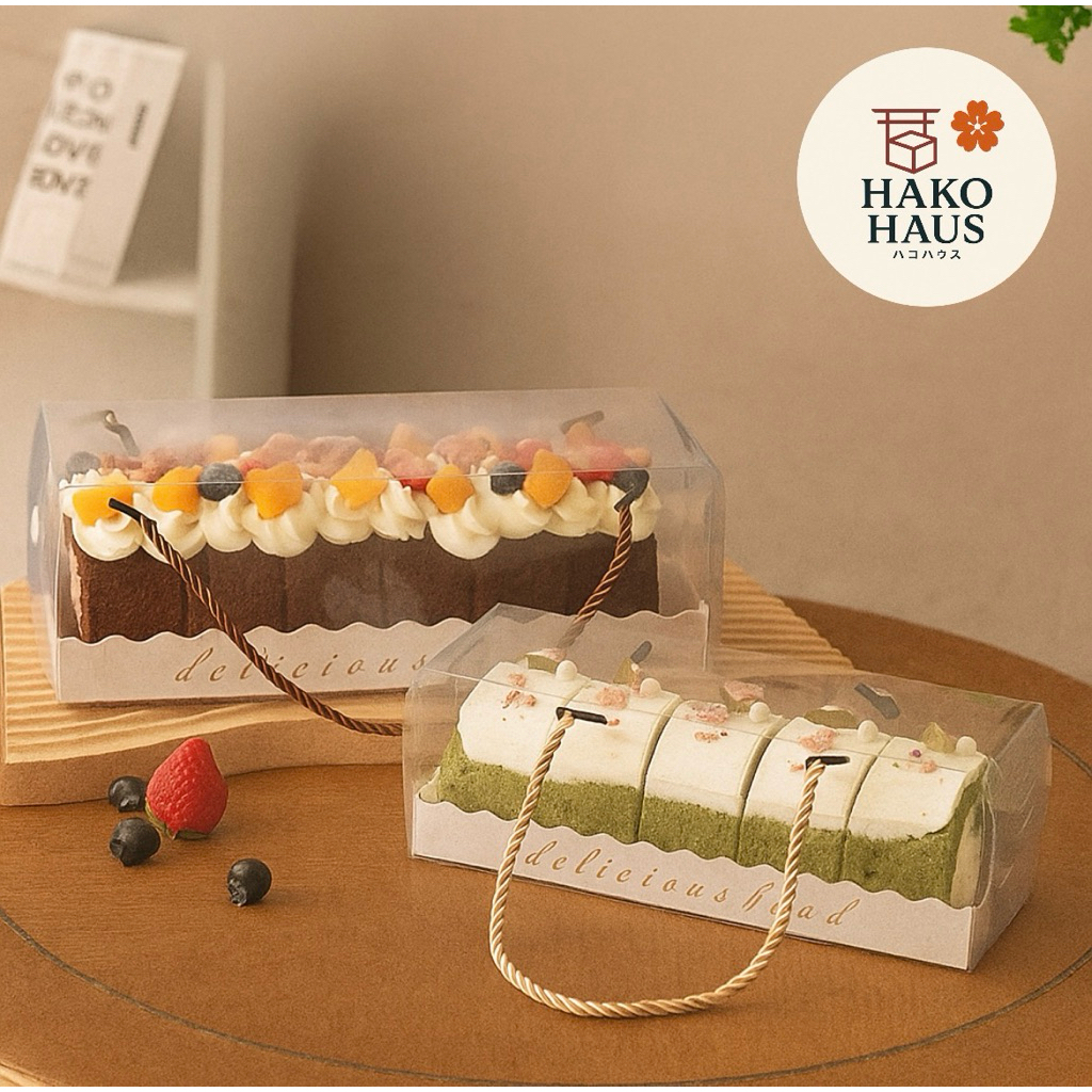 

HAKOHAUS Box Mika Rollcake Transparan Tali Emas Bening Kotak Kue Hampers Bolu Gulung