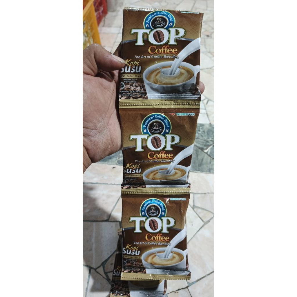 

Top Coffee Kopi susu per renceng isi 12 sachet