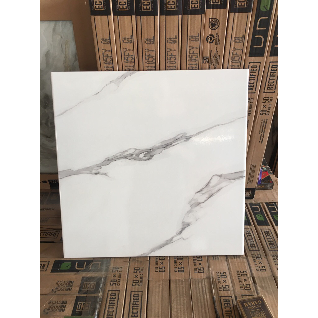 keramik 40x40 lantai glosy kilap putih motif carara petir ikad