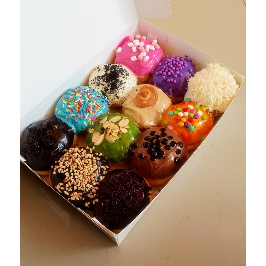 

Donat Bomboloni atau Topping