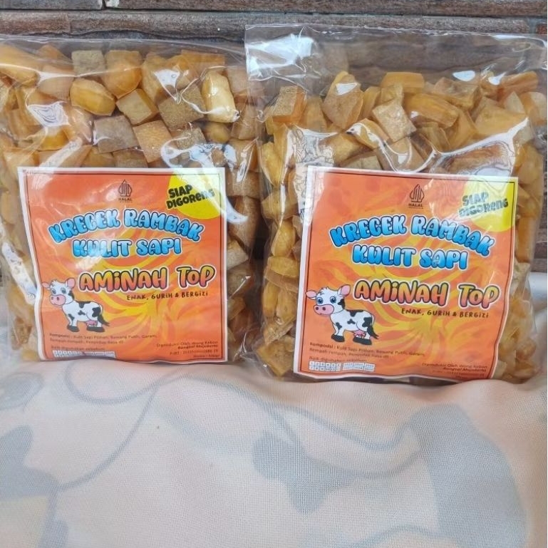 

Aminah top krecek rambak kulit sapi 1kg/krupuk kulit sapi mentah/krupuk jangek mentah/dorokdok/krecek rambak kulit sapi varian kotak dadu 1kg