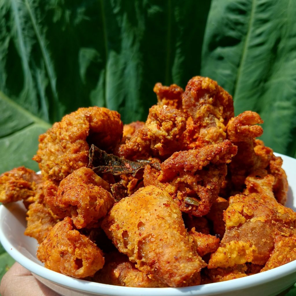 

Kulit Ayam Krispy kemasan 500gr Pedas Daun Jeruk