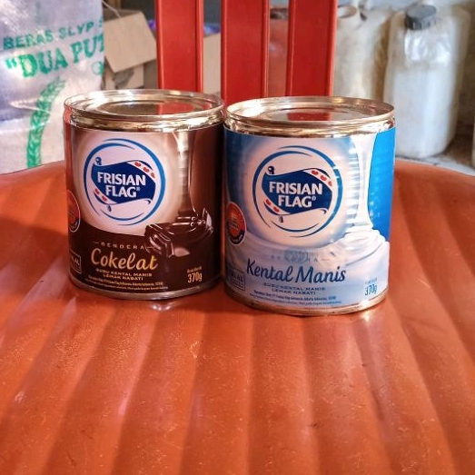 

susu Frisian flag cokelat putih berat 270gram