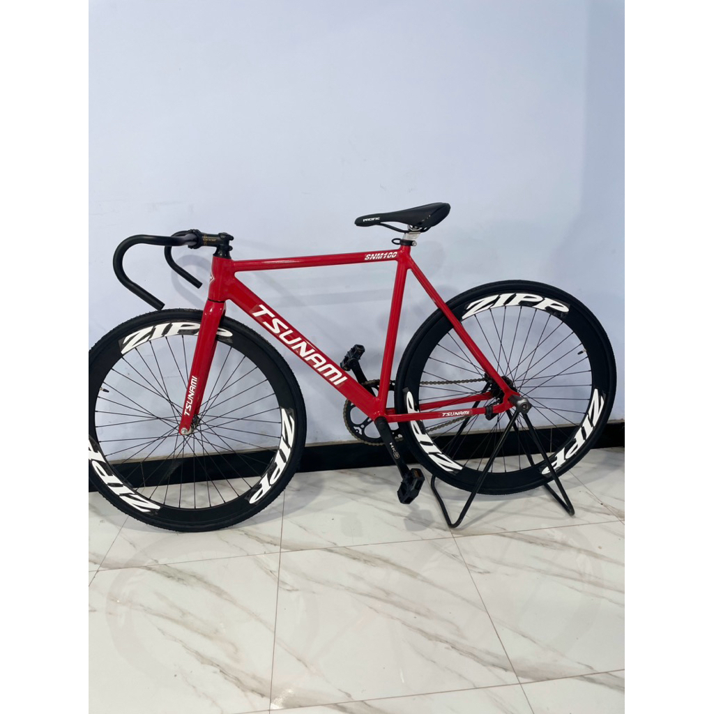Sepeda Fixie Tsunami snm 100 merah stiker velg Zipp