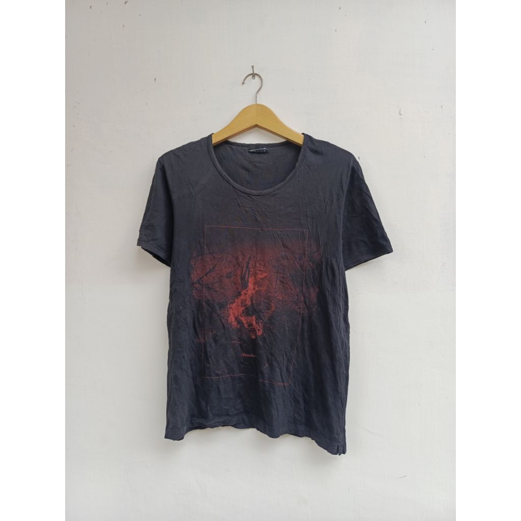 kaos lad musician burning guitar