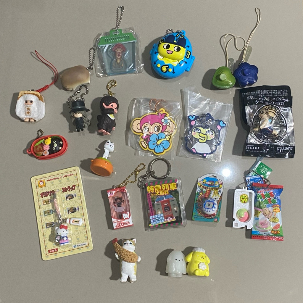 Various keychain gotochi trinkets gacha gashapon monchhichi kewpie sanrio lecreuset tamagotchi hello