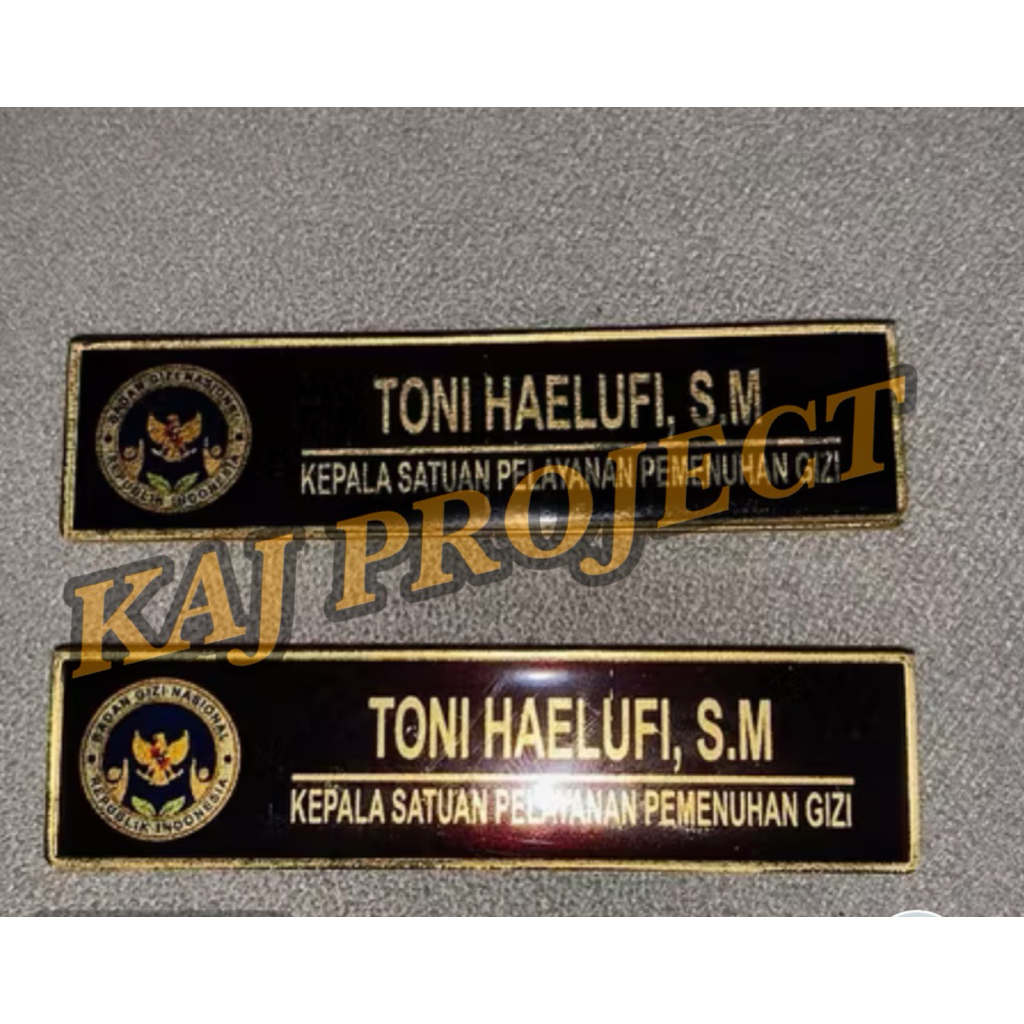 

Name Tag Kuningan BGN (BADAN GIZI NASIONAL) / Papan Nama Dada Kuningan Khusus Link Pegawai / Anggota BGN dan sudah berlogo BGN 2cm x 8cm Tebal 2mm Peniti Magnet SUPER PREMIUM 100% ORIGINAL
