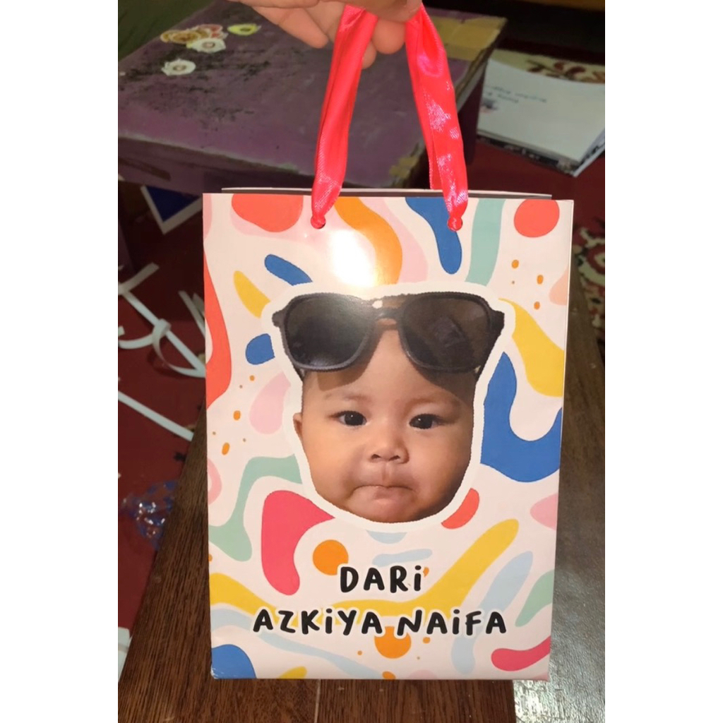 

Paperbag kecil gambar tengah (desain depan belakang bisa beda)