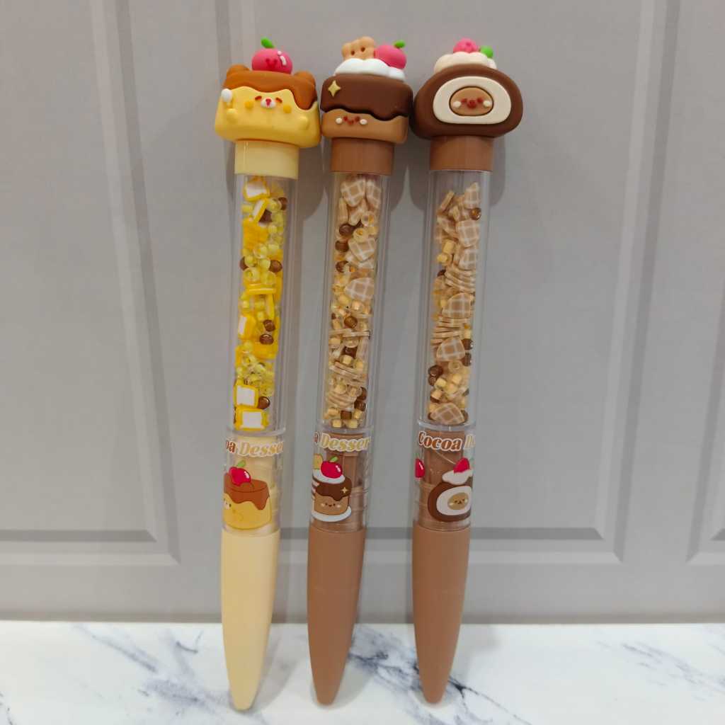 

Pink Ocean Pulpen Pena dengan kepala kue di atasnya Cake Serries Pen