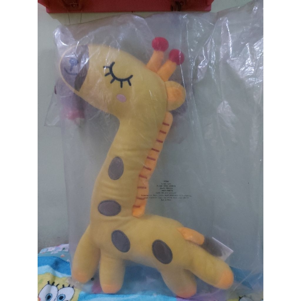 Boneka jerapah informa