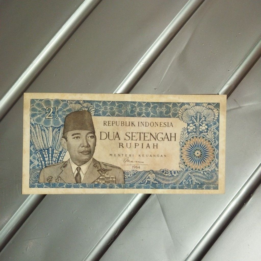 2,5 rupiah seri Sukarno asli sesuai foto agak kotor