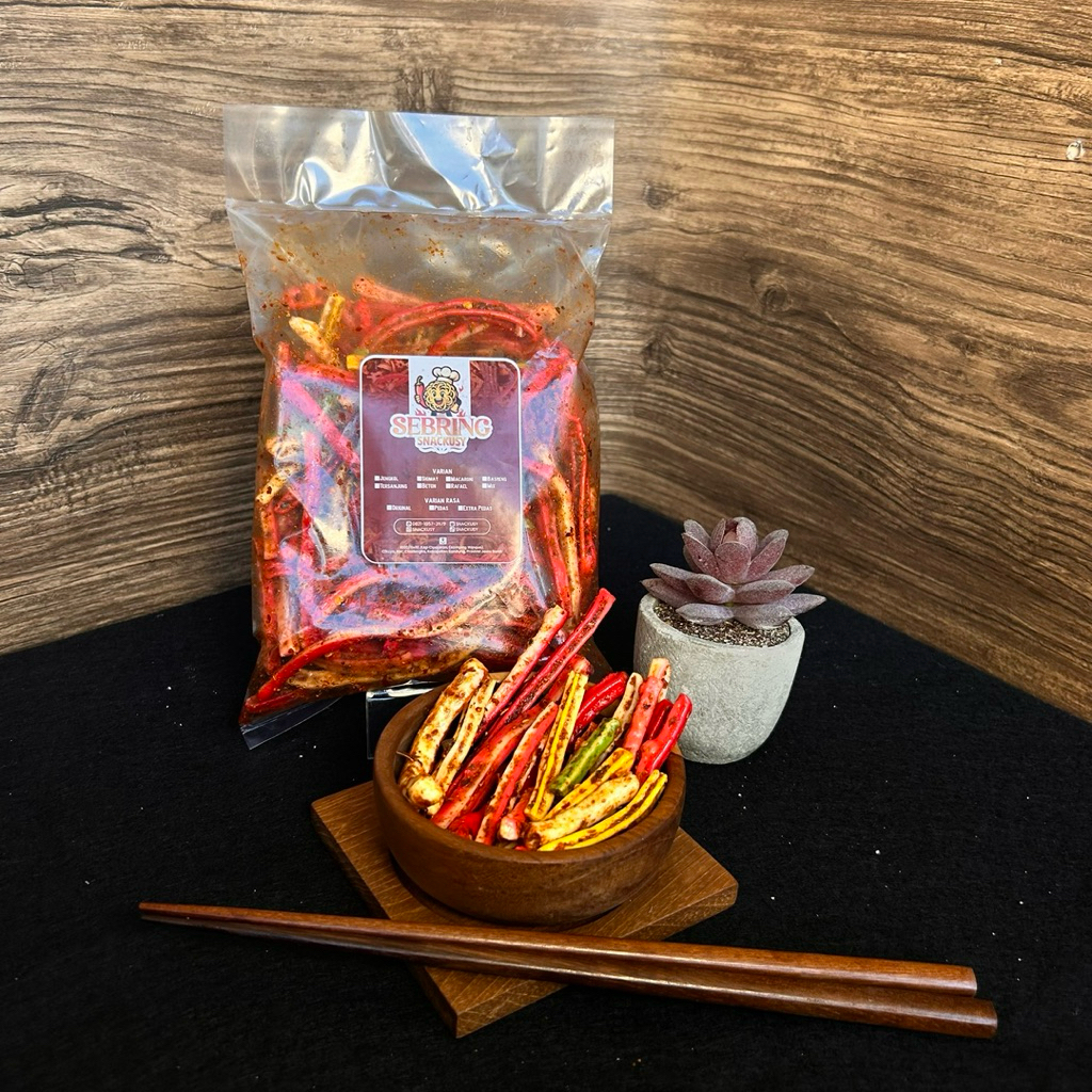 

KERUPUK SEBLAK KERING (SEBRING) - BETON CHILI OIL DAUN JERUK EXTRA PEDAS 180 GRM