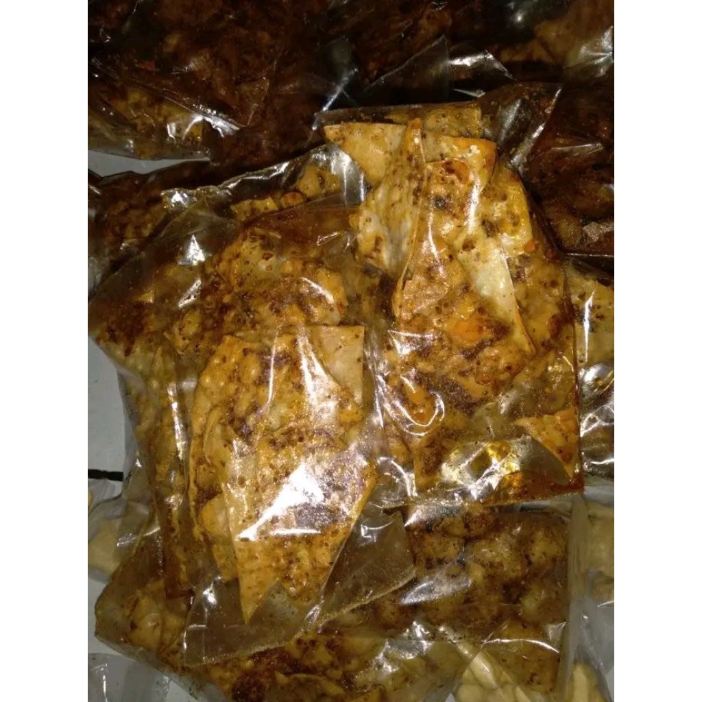 

kulitPangsitPedas Daun jeruk/pangsit goreng/terlaris 250gram