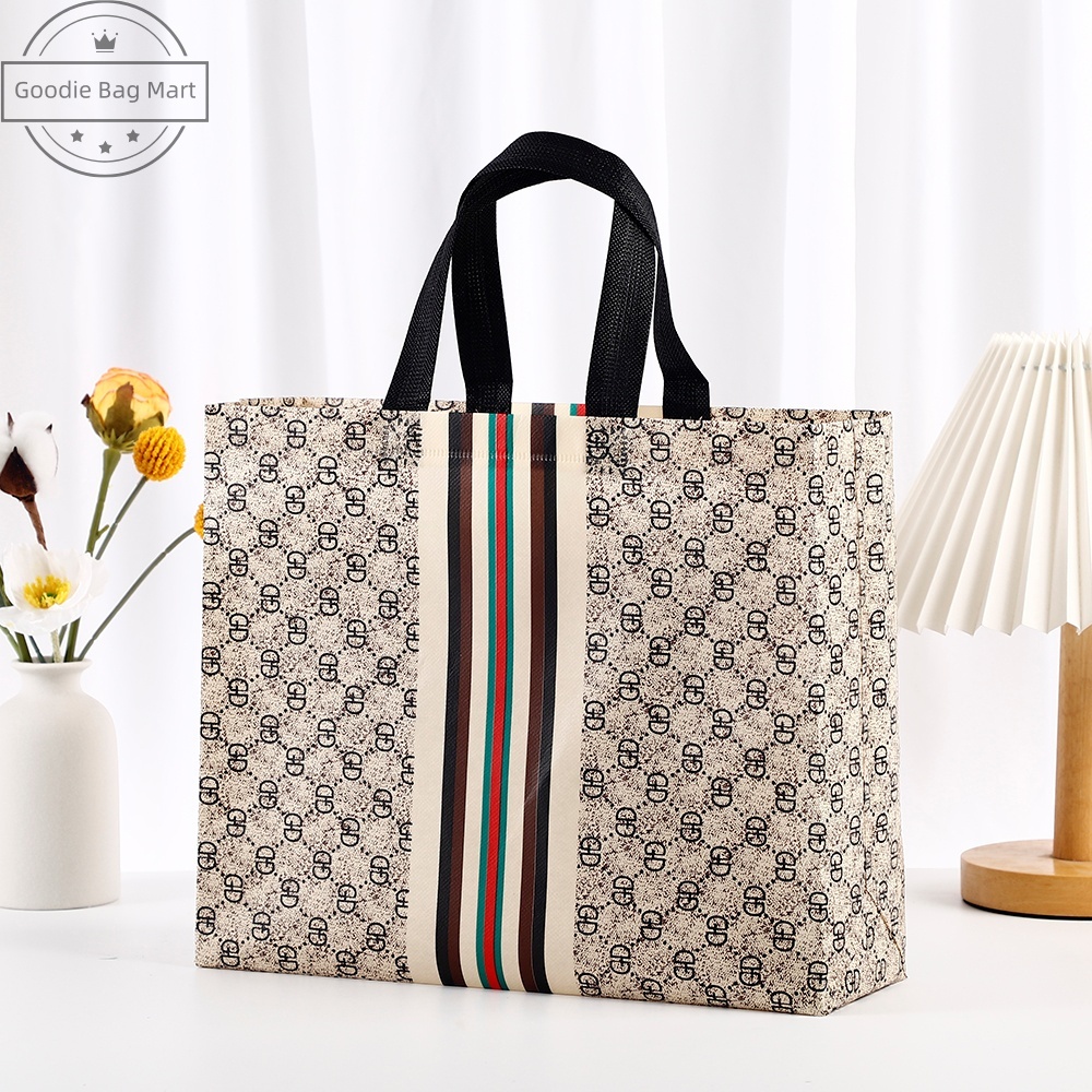 

Membentuk-A62/Goodie bag-Tas Belanja tas Jinjing tas spunbond tas souvenir premium tebal dan kuat/Terlaris lipat jumbo/ waterproof/shopping bag Tas Belanja Murah Karakter Kartun