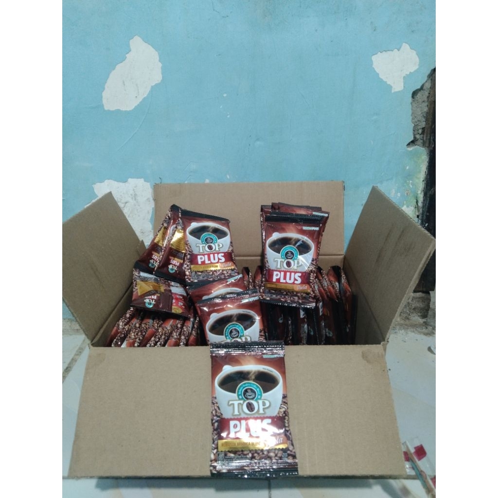 

Kopi Top Plus Gula Renceng kemasan 10x 18gr Sachet