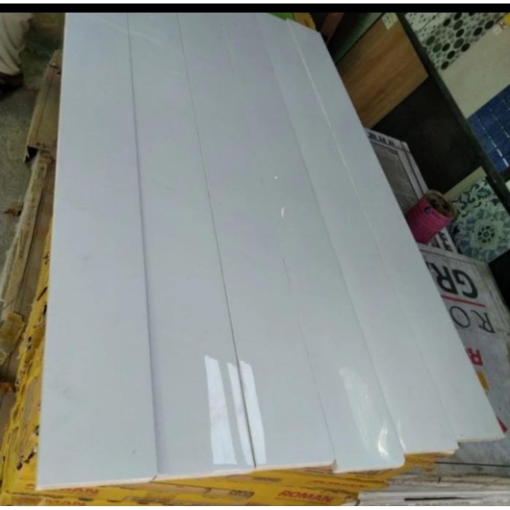 GRANIT LIST PLINT 10X60 PUTIH POLOS
