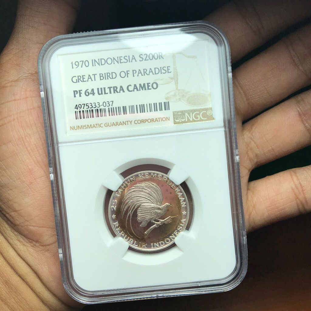 Koin Kuno Seri Kemerdekaan Cendrawasih NGC 64 Koin Proof black Patina