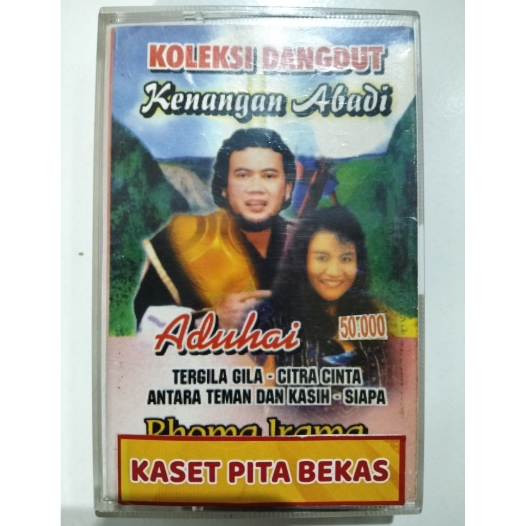 kaset pita bekas dangdut Rhoma irama vs noer Halimah aduhai